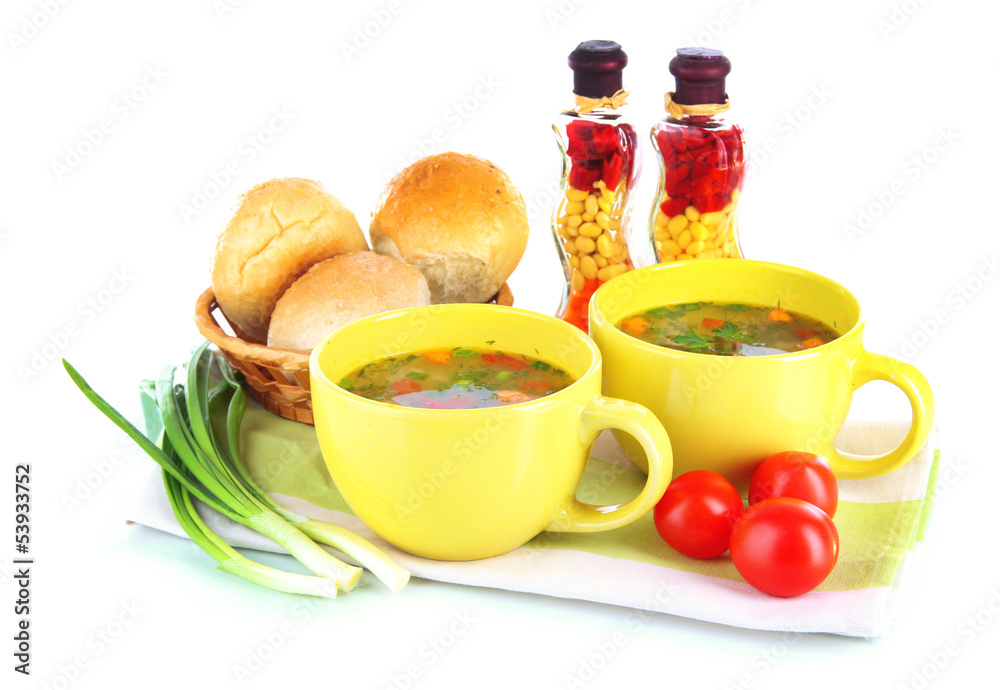 Fragrant soup in cups isolated on white Fragrant soup in cups isolated on white