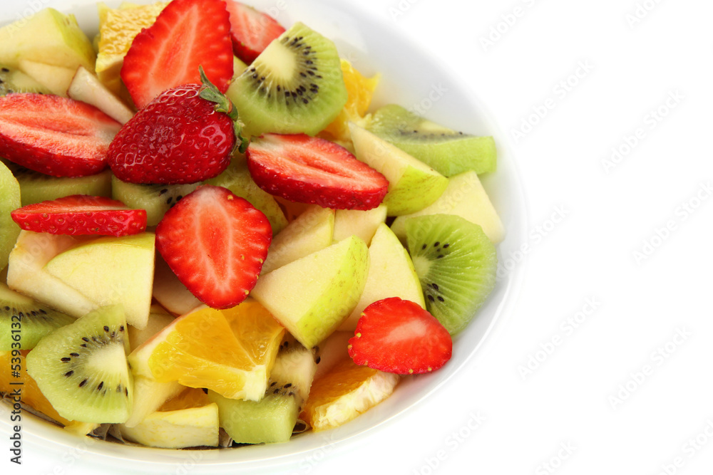 Useful fruit salad of fresh fruits and berries in bowl isolated Useful fruit salad of fresh fruits and berries in bowl isolated