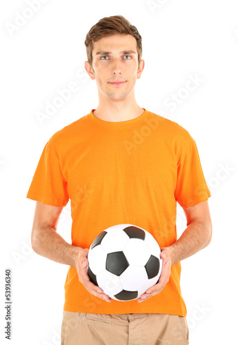 Young soccer player holding ball, isolated on white
