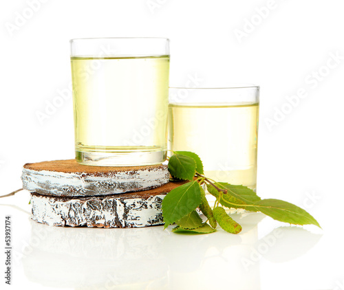 Glasses of birch sap, isolated on white