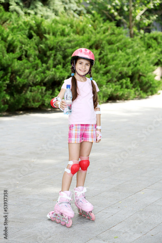 Little girl in roller skate...