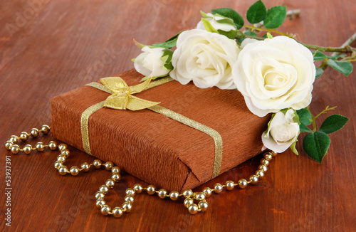 Romantic parcel on wooden background
