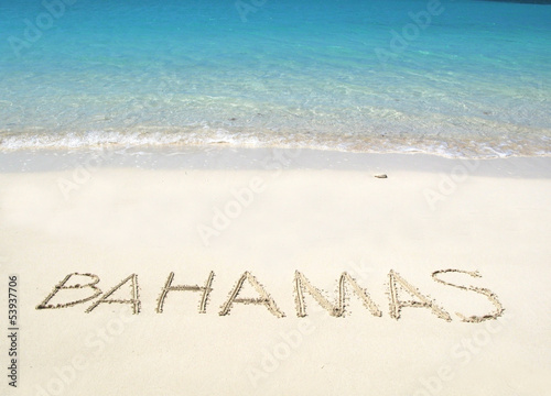 BAHAMAS writing on a desrt beach