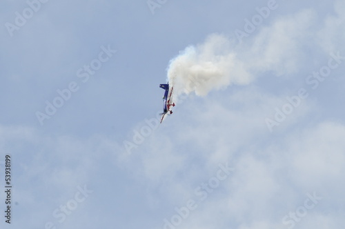 Airshow of a small propeller airplane
