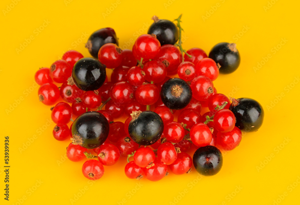 Currants on yellow background Currants on yellow background
