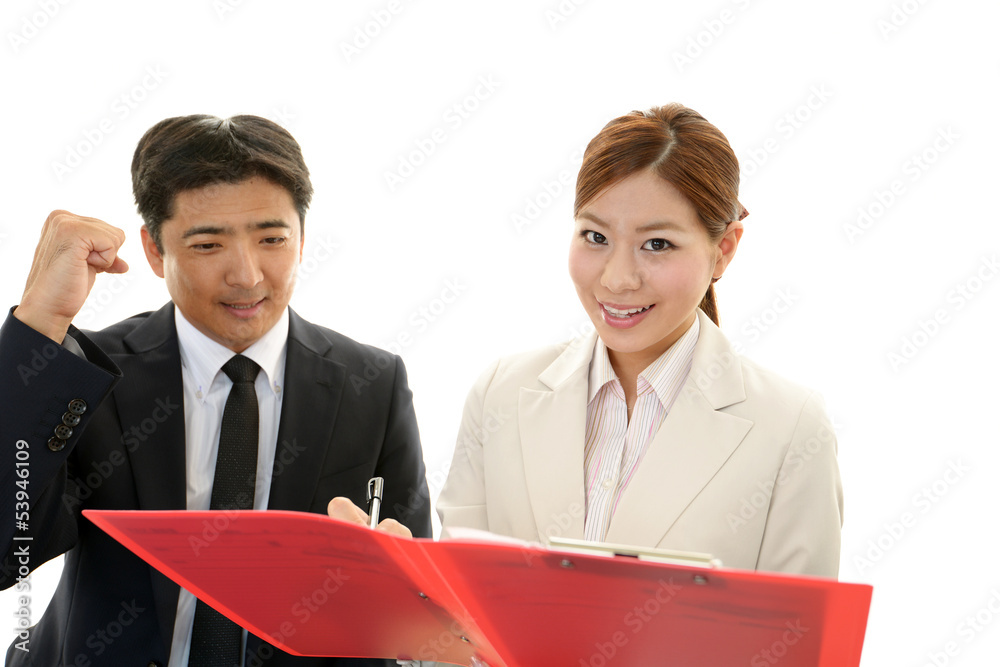 笑顔のビジネスマンとOL