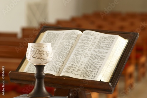 Chalice and Holy Bible opened at church