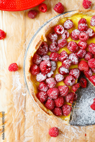 tart with fresh raspberries and cream  top view