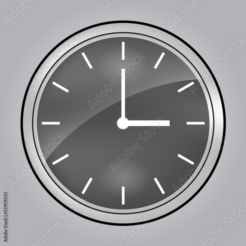Grey wall clock at 3 o'clock