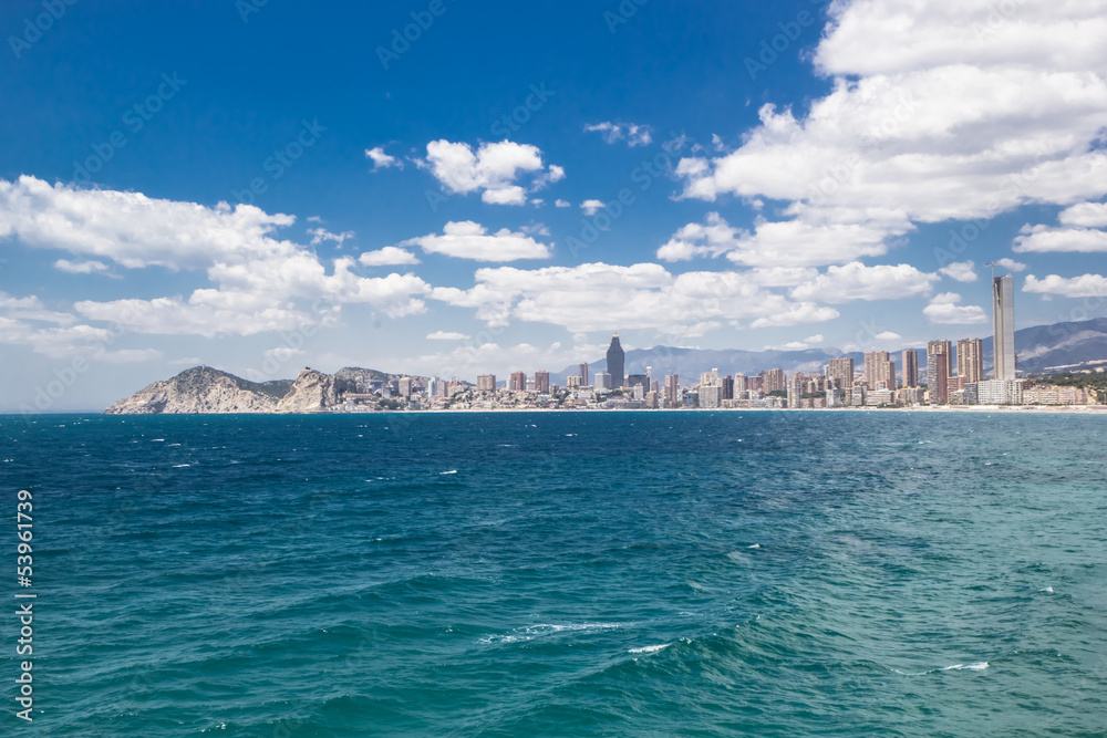 Hotels and beach of Benidorm. Sky and sea.