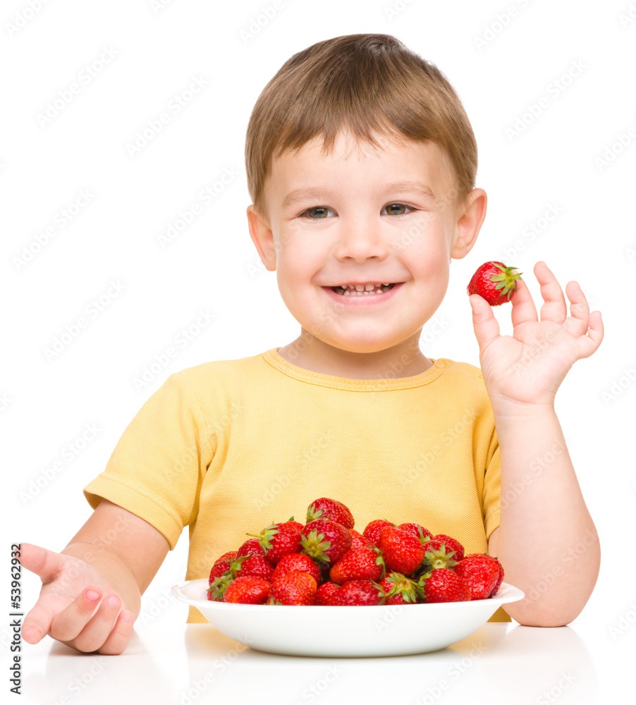 Little boy with strawberries Little boy with strawberries