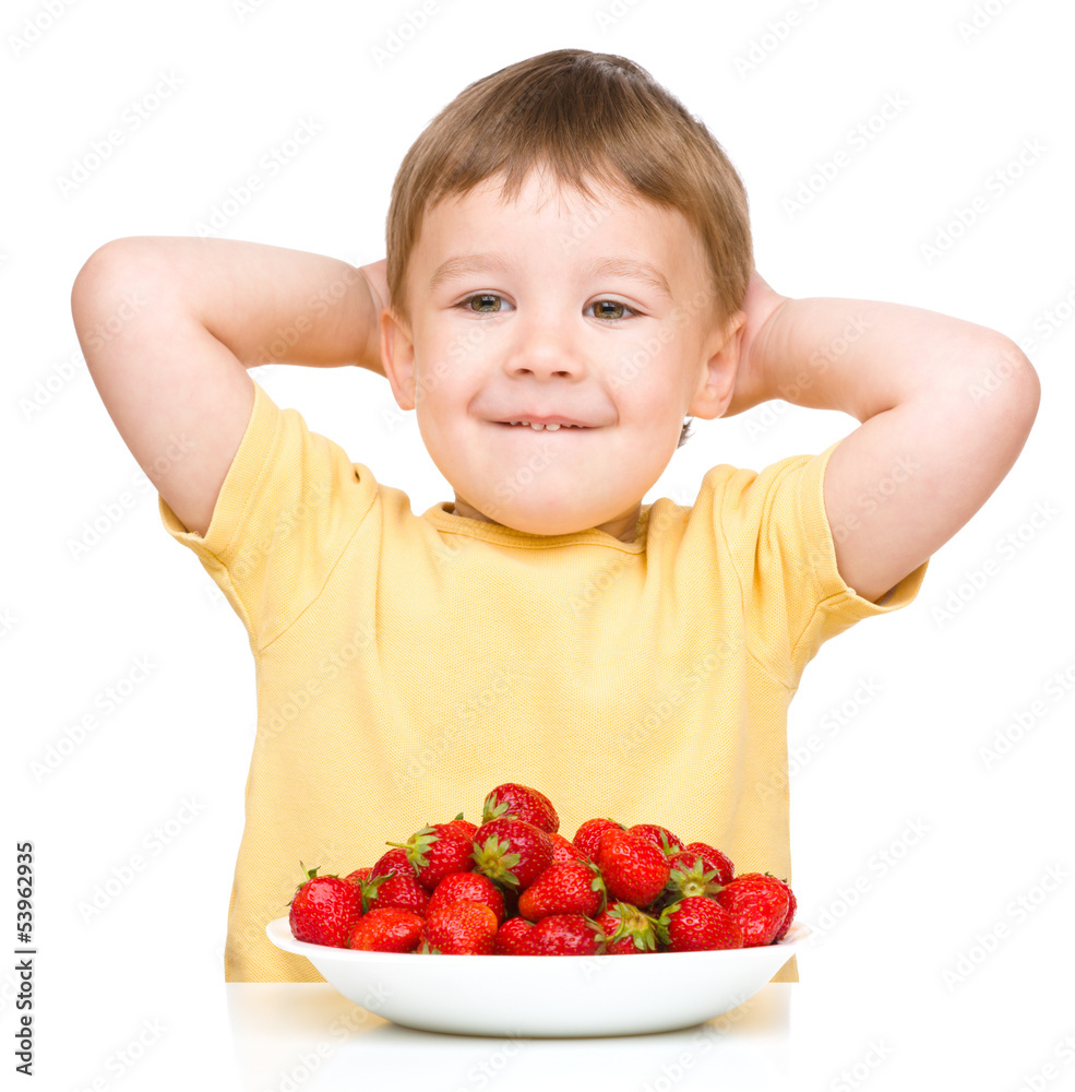 Little boy with strawberries Little boy with strawberries
