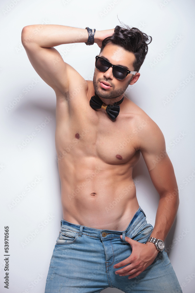 topless young man in a sexy pose Stock Photo | Adobe Stock