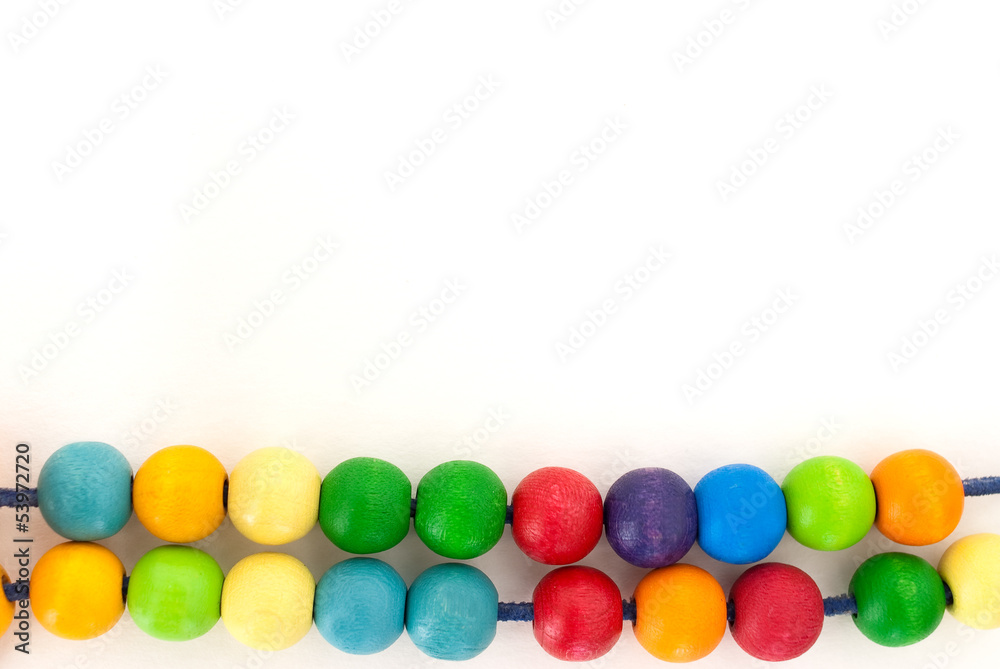 Background with colored wooden pearls Background with colored wooden pearls