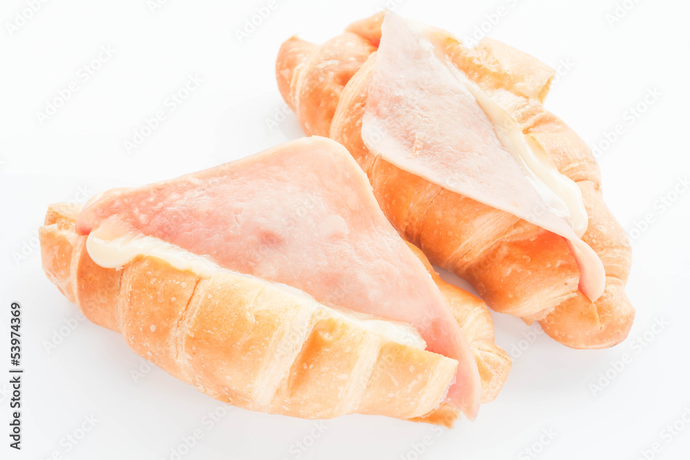 Couple of mini ham cheese croissants isolated on white backgroun Couple of mini ham cheese croissants isolated on white backgroun