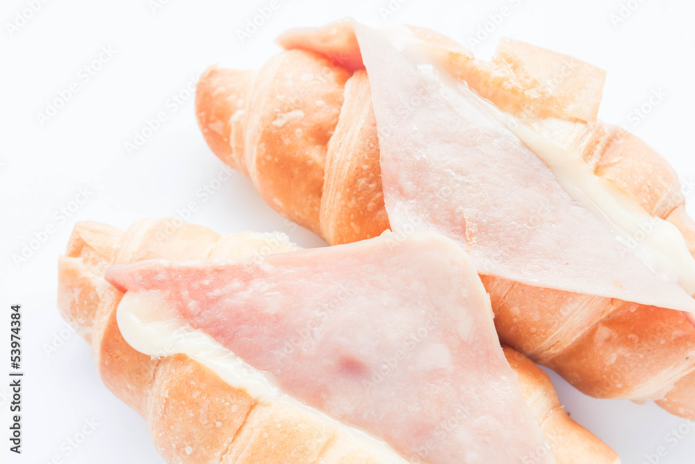 Close up ham cheese croissants isolated on white background Close up ham cheese croissants isolated on white background