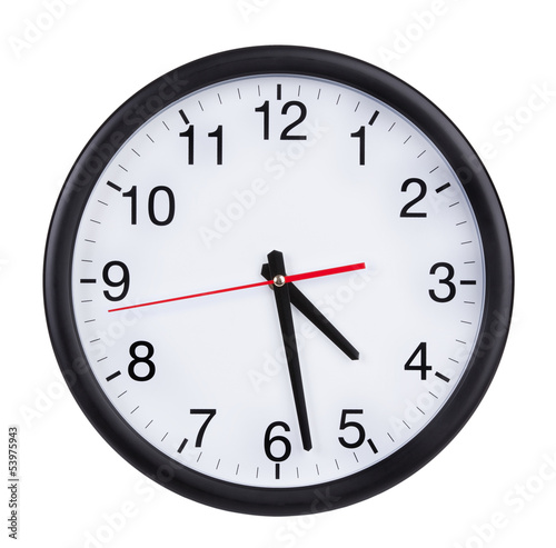 Office clock shows half past four