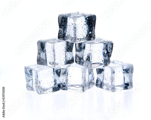Ice cubes with water drops isolated on white background