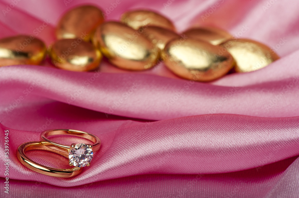 wedding rings on colorful fabric wedding rings on colorful fabric