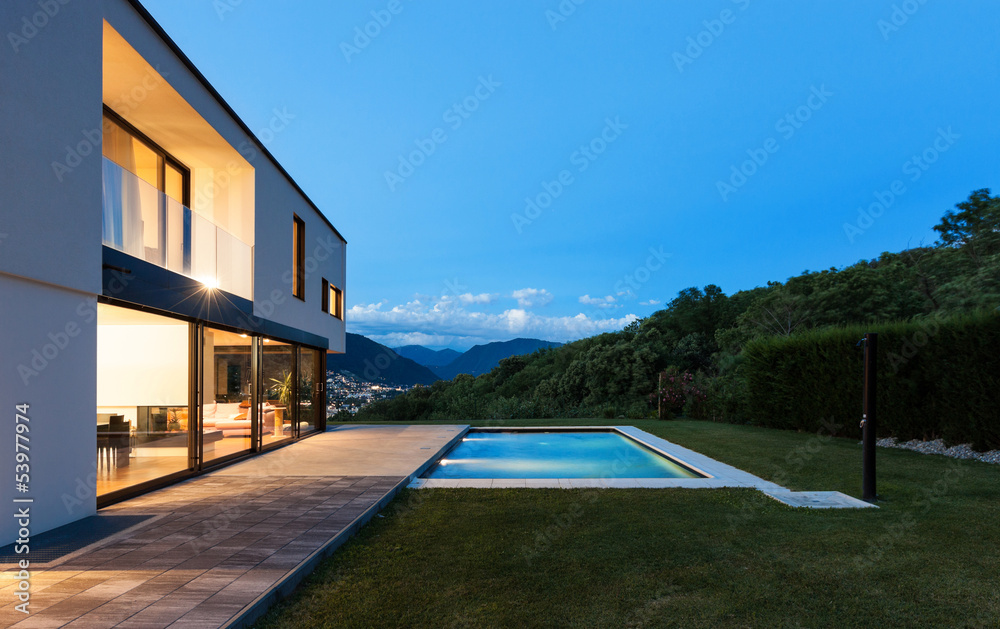 Fototapeta premium Modern villa with pool, night scene