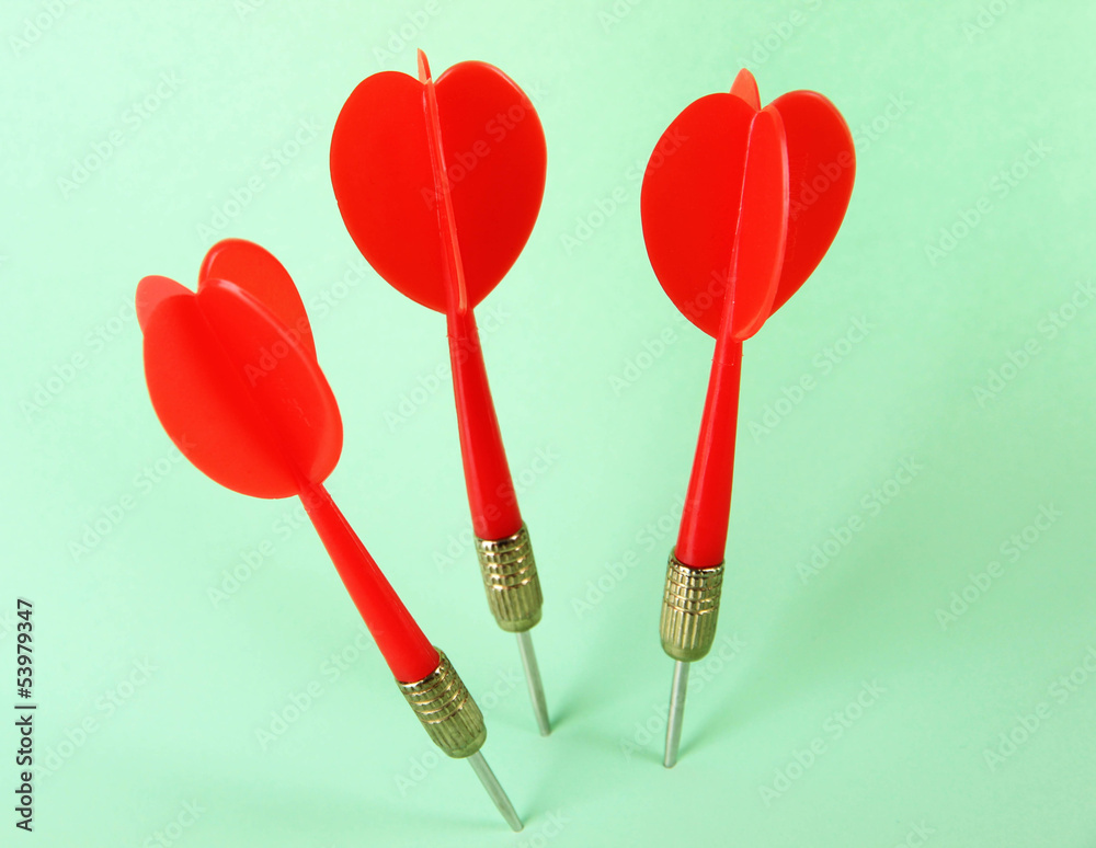 Darts on blue background Darts on blue background