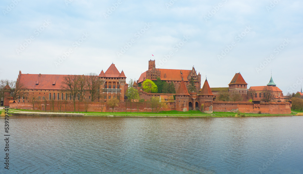 Teutonic castle Malbork in Pomerania region of Poland over Nogat