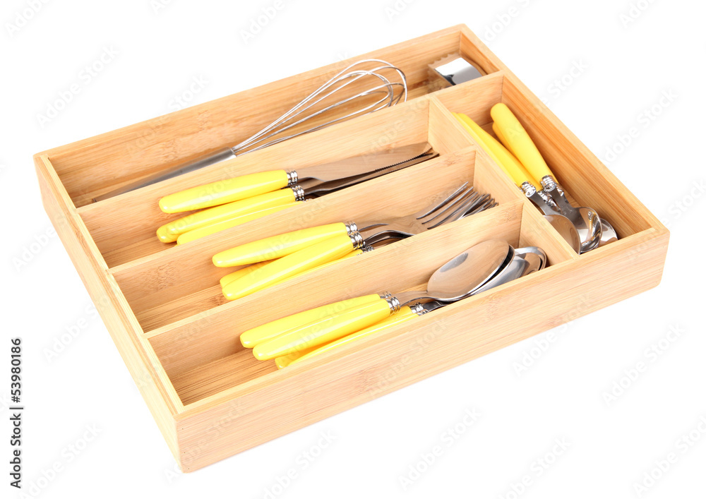 Wooden cutlery box with checked cutlery isolated on white