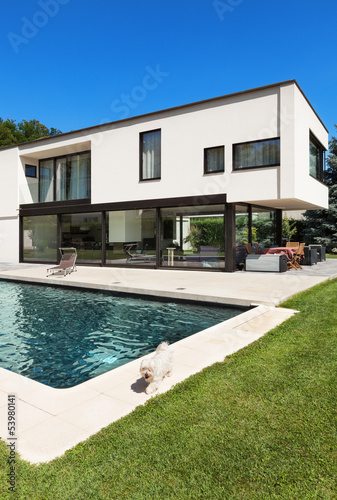 Modern villa with pool, view from the garden