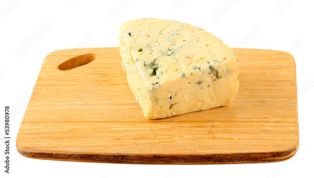 Tasty blue cheese on cutting board, isolated on white