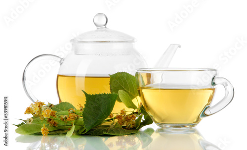 Kettle and cup of tea with linden isolated on white