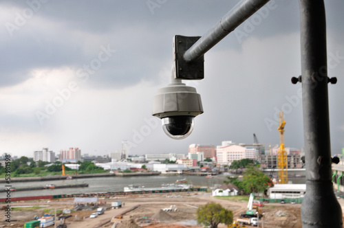Security CCTV camera for monitors construction site area. © badztua