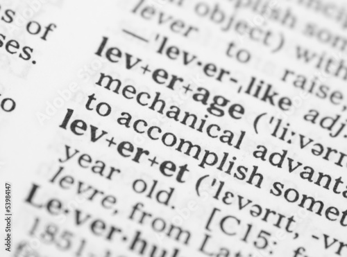 Macro image of dictionary definition of leverage