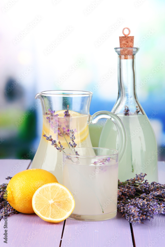 Lavender lemonade in glass bottle and jug, Lavender lemonade in glass bottle and jug,