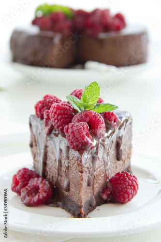 Chocolate cheesecake with raspberries.