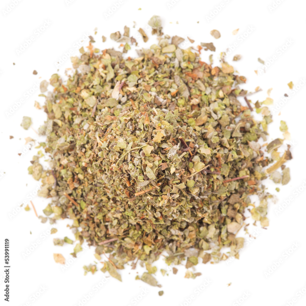 Dried marjoram on a white background - top view Dried marjoram on a white background - top view