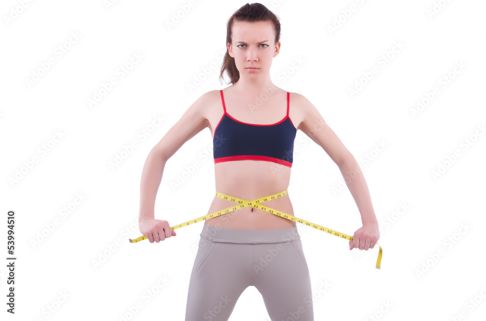 Young girl with centimeter in dieting concept Young girl with centimeter in dieting concept