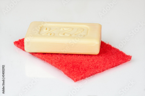 soap with a washcloth to clean the apartment