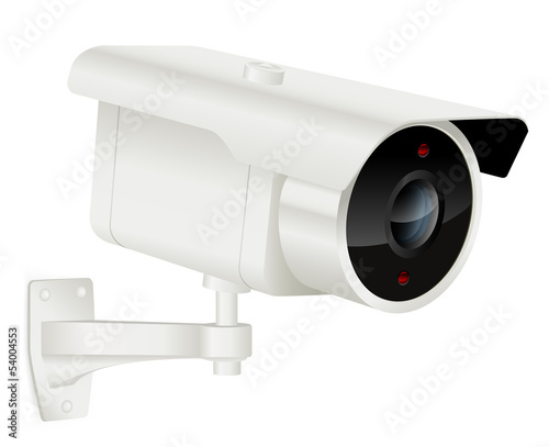 Security camera mounted on wall
