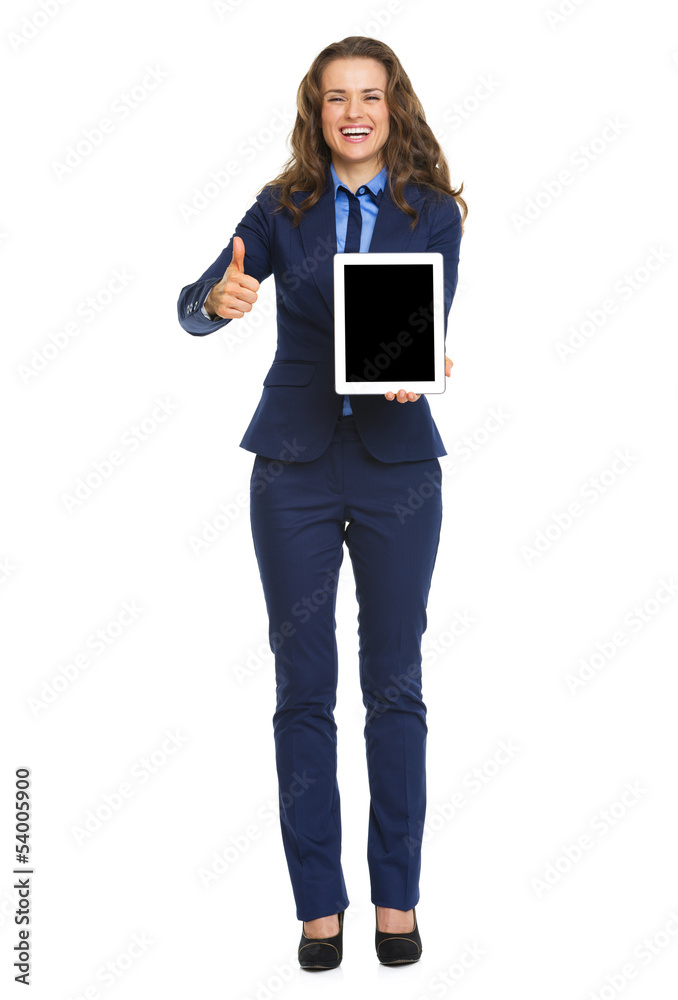 Full length portrait of smiling business woman showing tablet pc Full length portrait of smiling business woman showing tablet pc