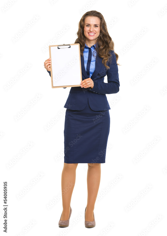 Full length portrait of business woman showing blank clipboard Full length portrait of business woman showing blank clipboard
