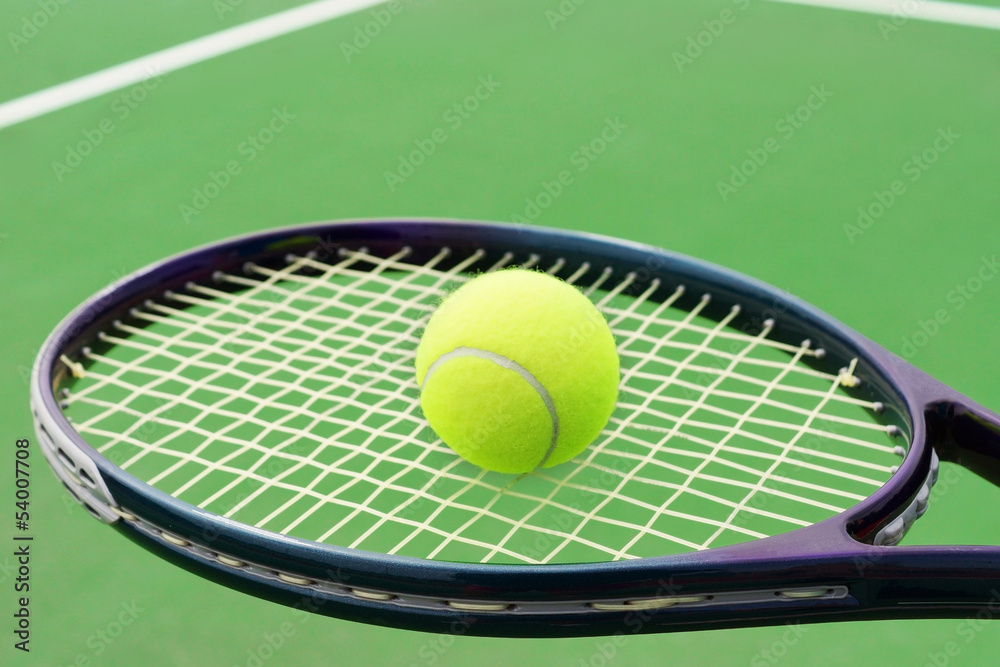 Tennis racket with ball
