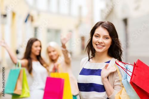 girls with shopping bags in ctiy
