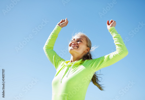 woman runner celebrating victory