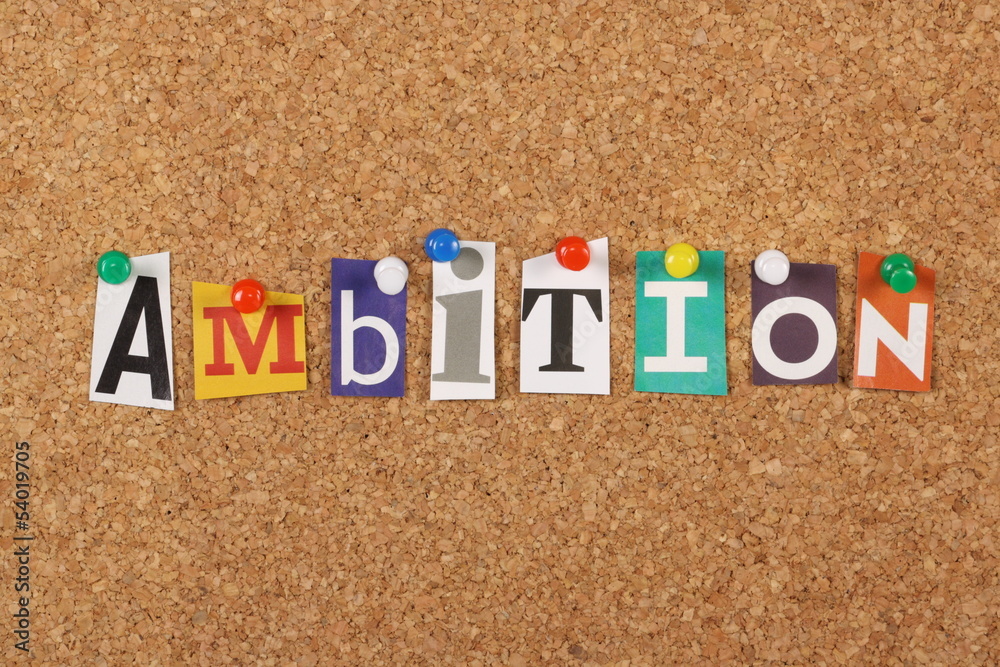 The word Ambition on a cork notice board The word Ambition on a cork notice board