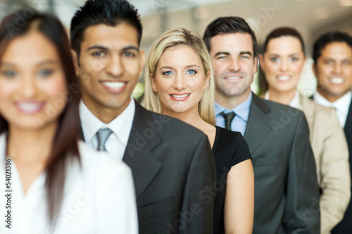 business executives standing in a queue