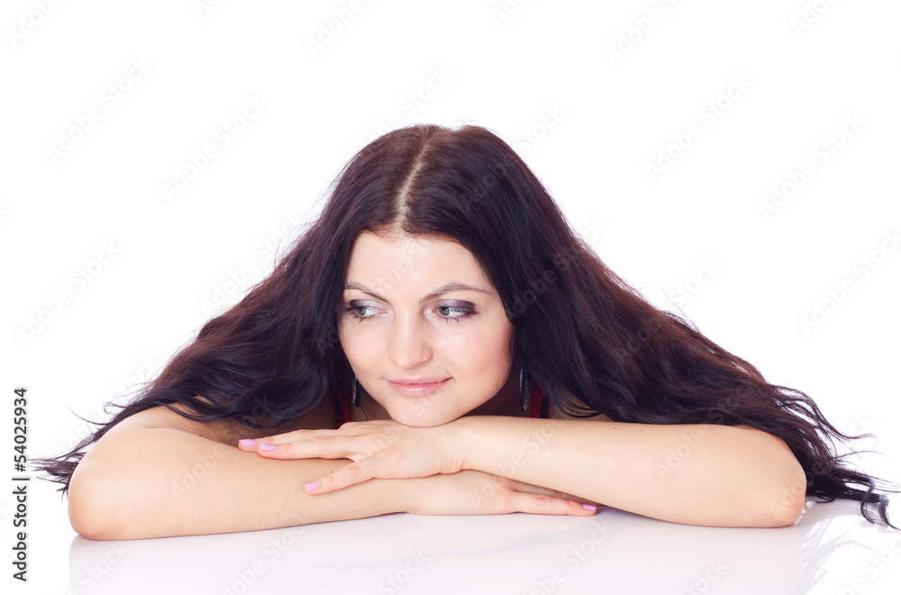 Portrait of young woman looking towards smb. Portrait of young woman looking towards smb.
