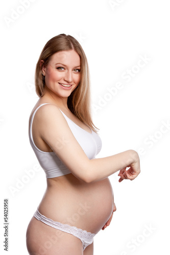 Profile portrait of pregnant woman