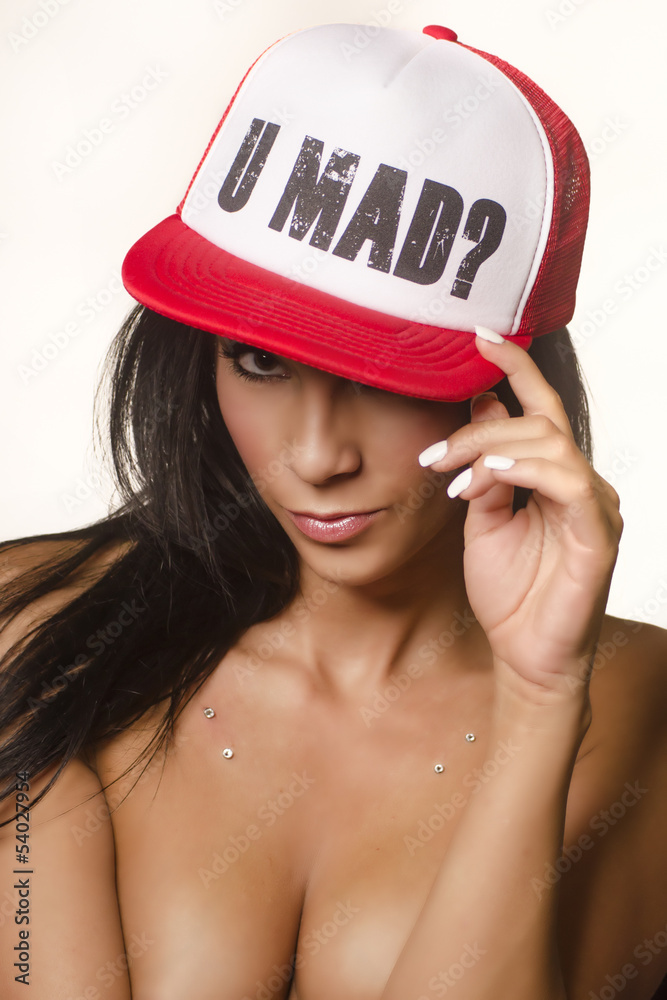 Sexy woman wearing baseball cap Stock Photo | Adobe Stock