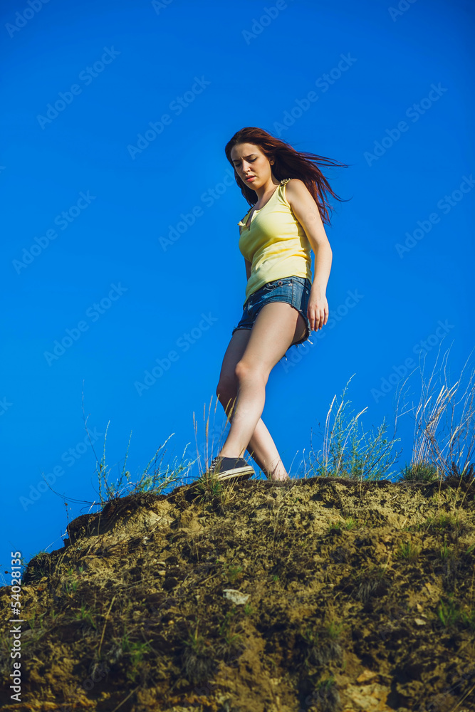 acrophobia punk woman hippie suicide tall stands on top of a roc acrophobia punk woman hippie suicide tall stands on top of a roc