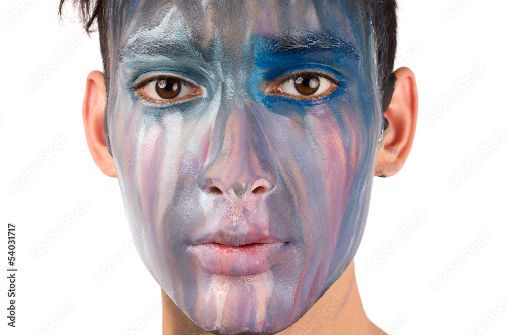 Fototapeta premium Beautiful young man painted on the face